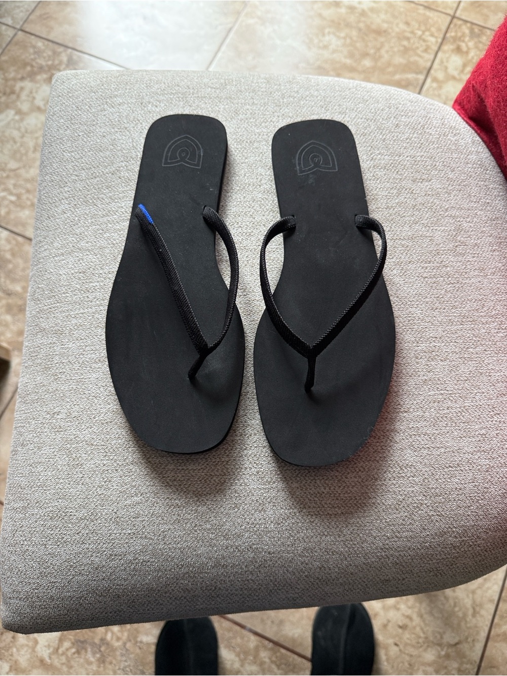 Black Rothy’s Flip Flop Sandals